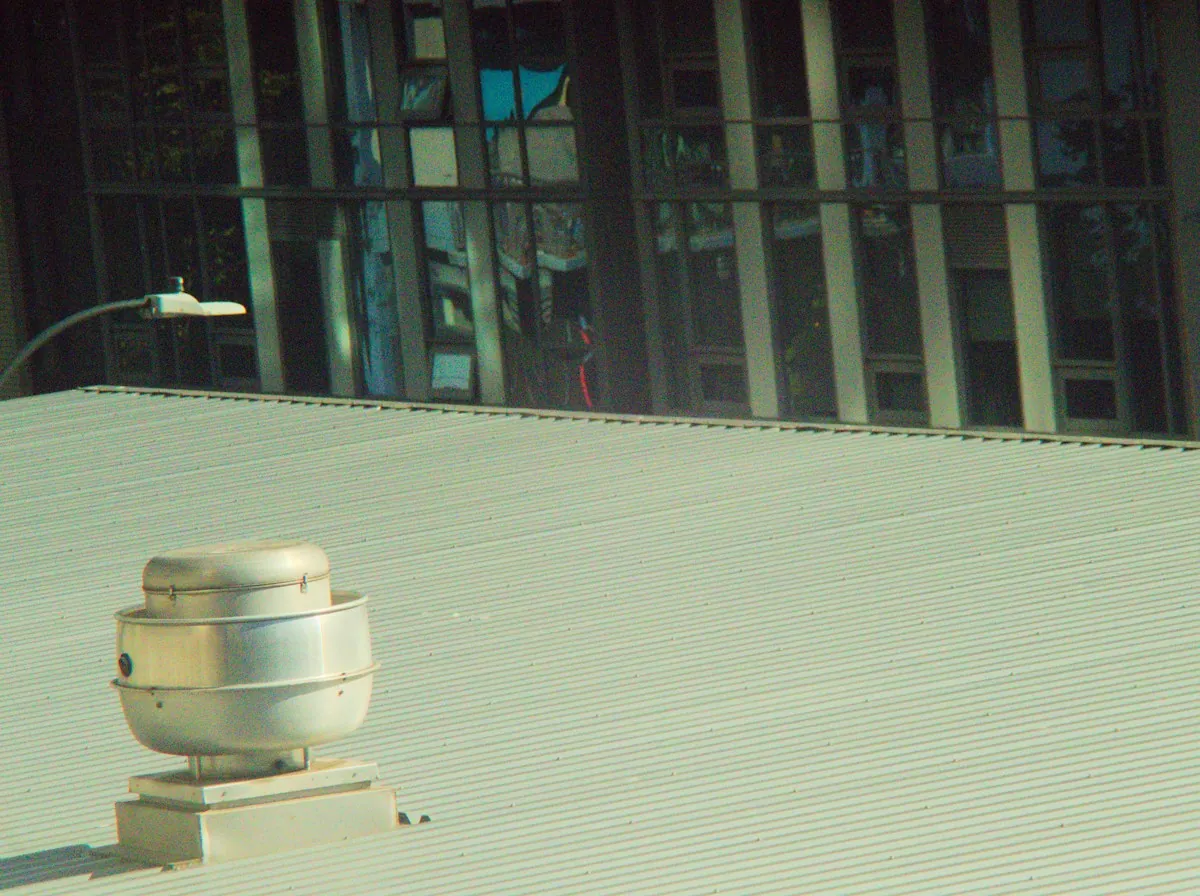 Flat Roof Replacement in Hesperia — a roof vent on a low-slope metal roof