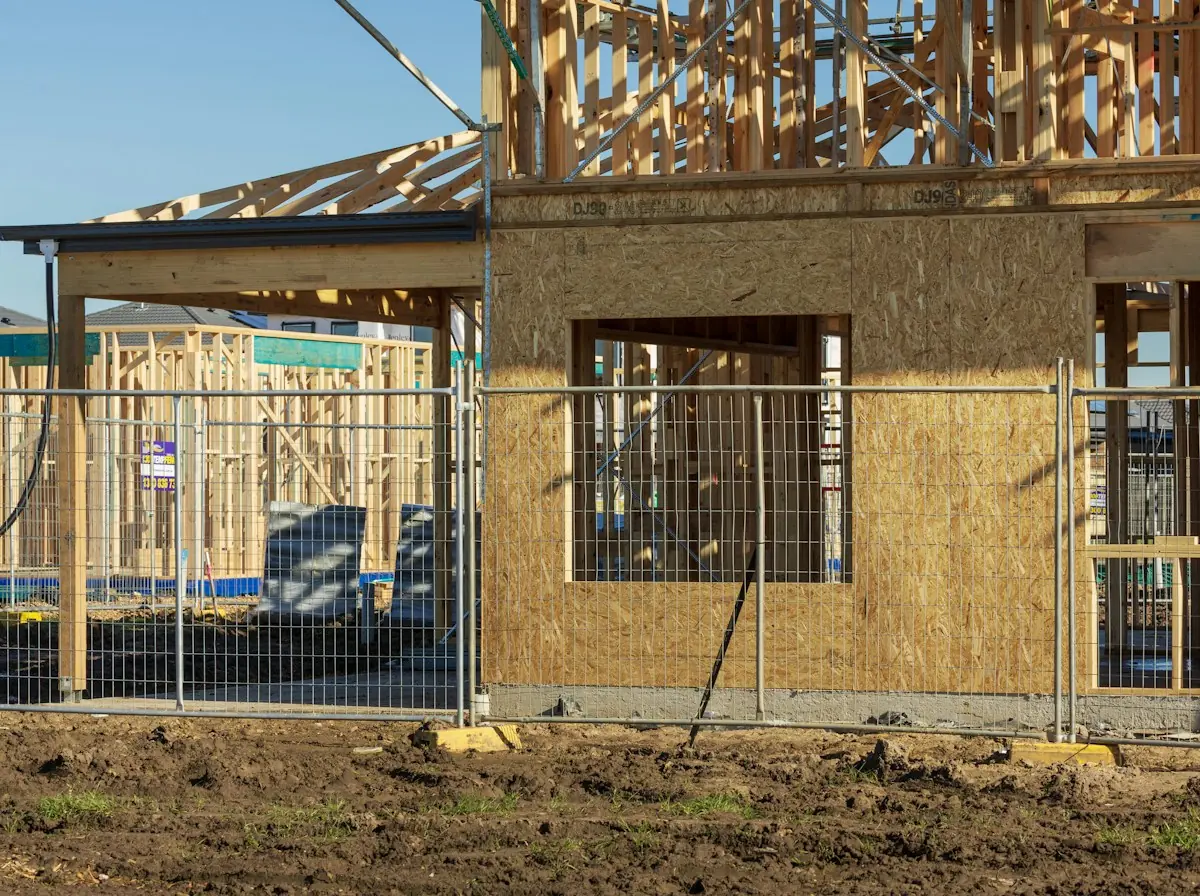 Roof Replacement in Hesperia — timber wall and roof framing on a new house